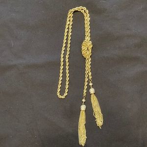 Vintage thick gold-tone necklace with knot design and tassels